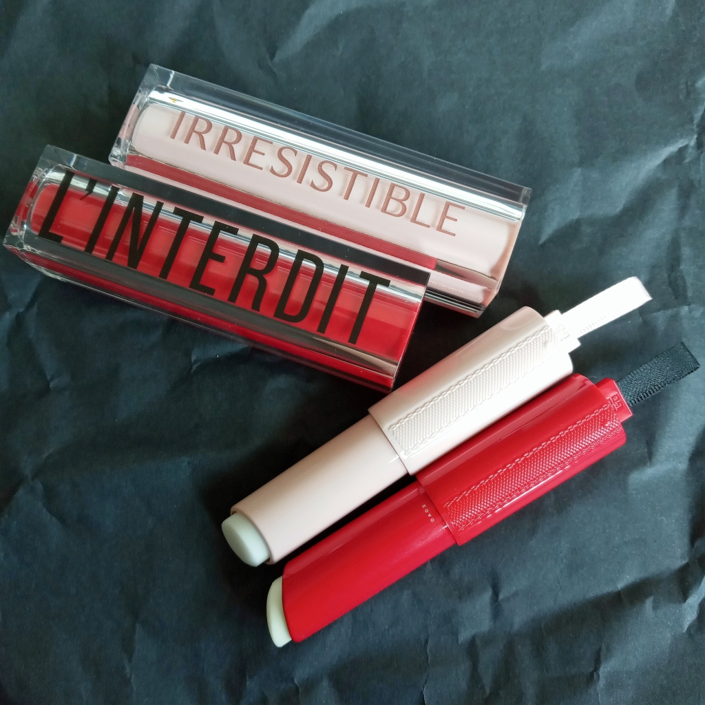 The L'Interdit and Irresistible solid fragrances, with the fragrance tubes removed from the cases.